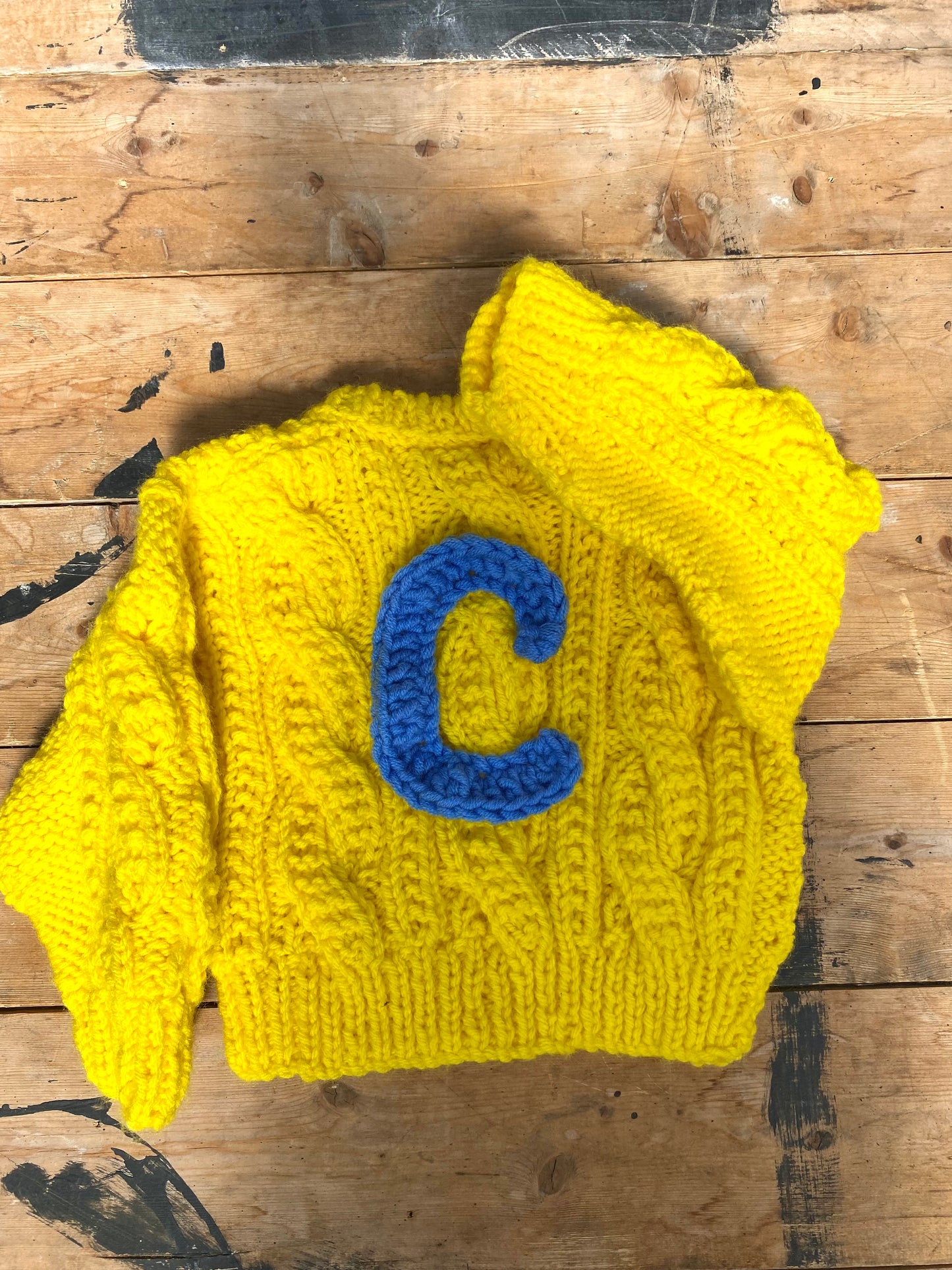 Yellow chunky cable cardigan (12-18 months)