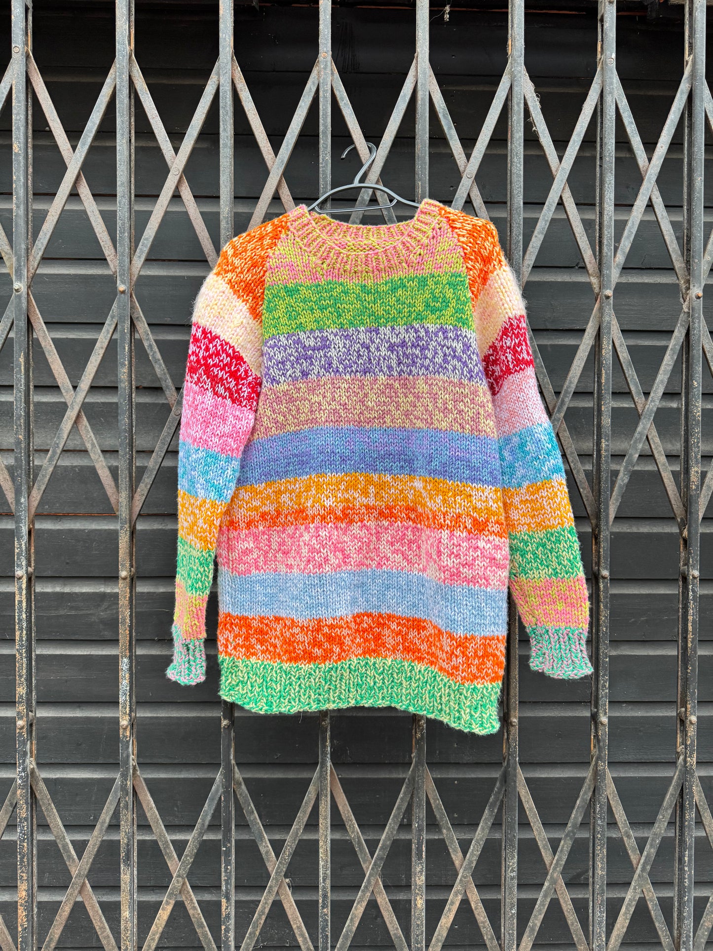 Women's twisted rainbow stripe jumper