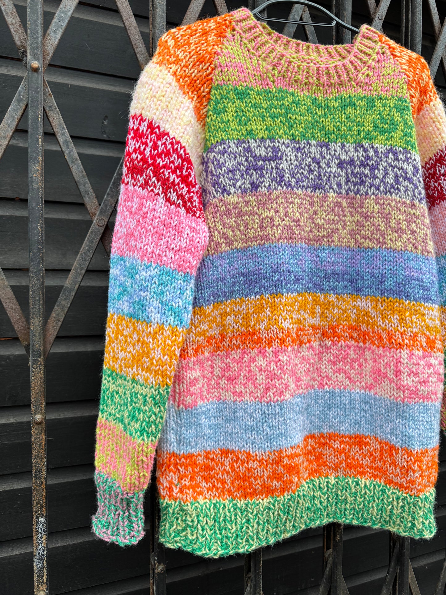 Women's twisted rainbow stripe jumper