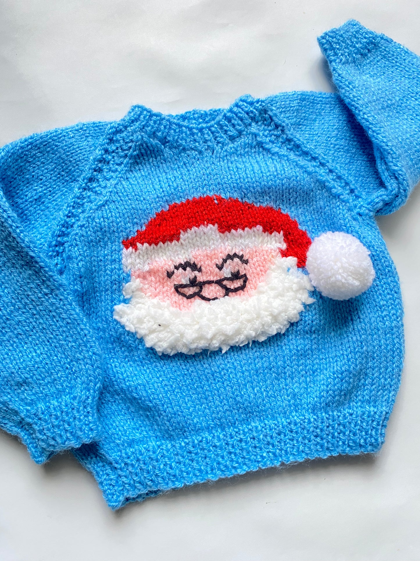 Blue Father Christmas logo jumper (3-6 months)