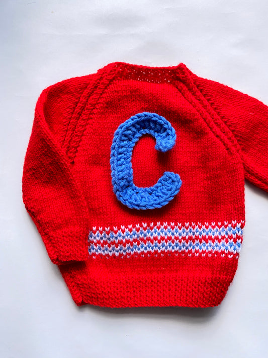 Red fairisle hem jumper (6-12 months)