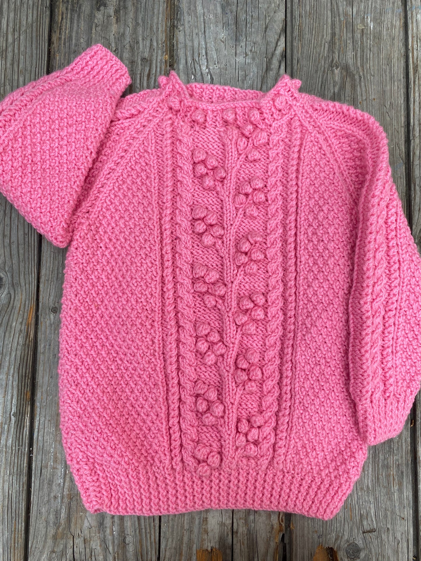 Bright pink chunky cable jumper (5-6 years)