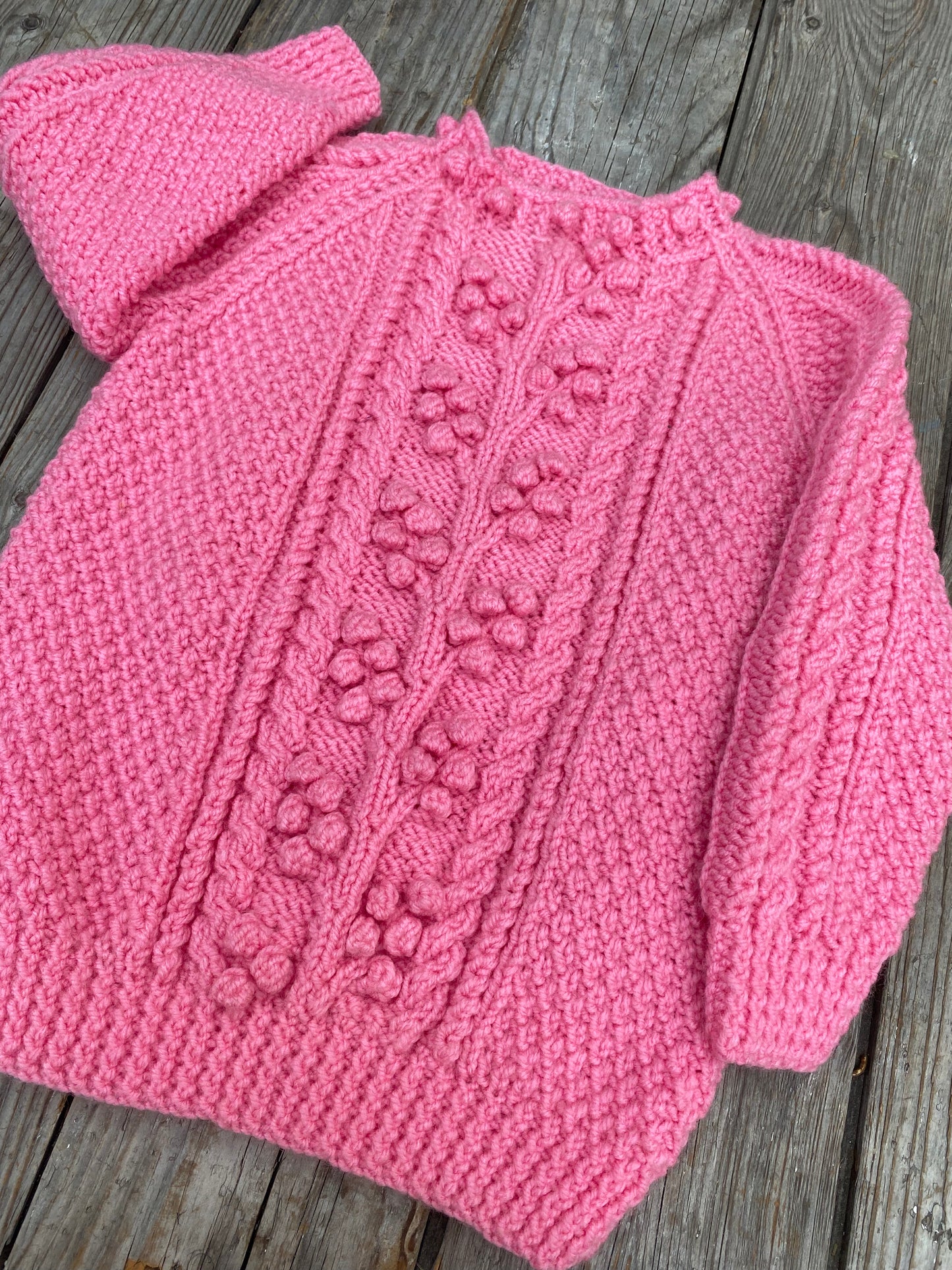 Bright pink chunky cable jumper (5-6 years)