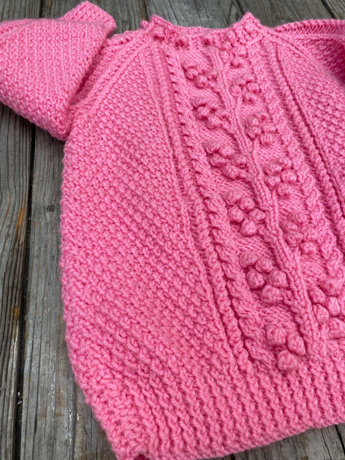 Bright pink chunky cable jumper (5-6 years)