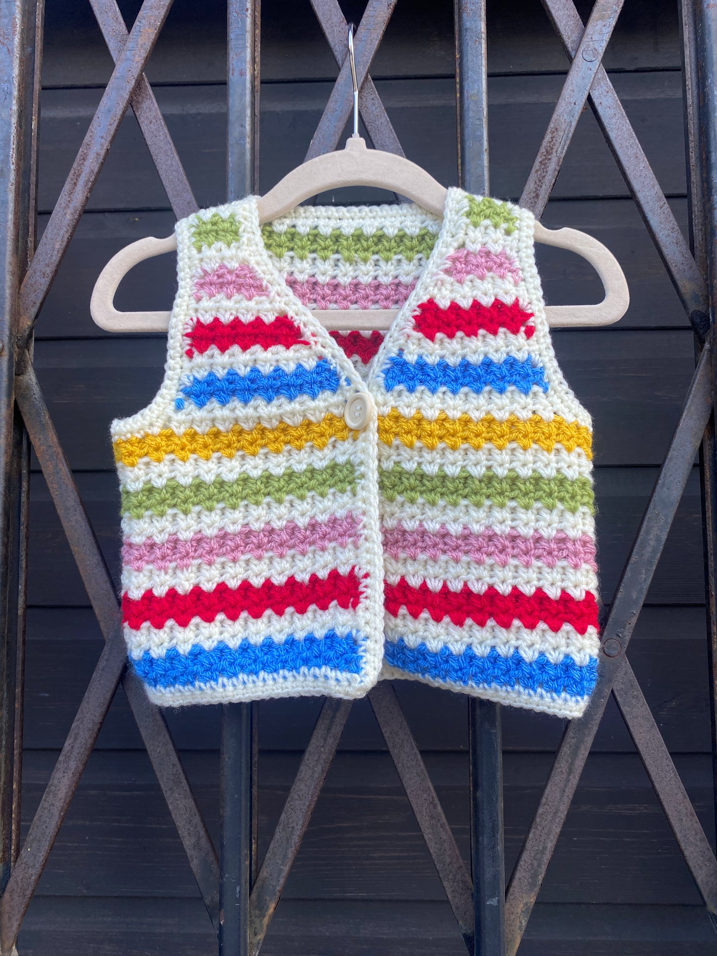 Rainbow stripe crochet waistcoat (0-6 months)
